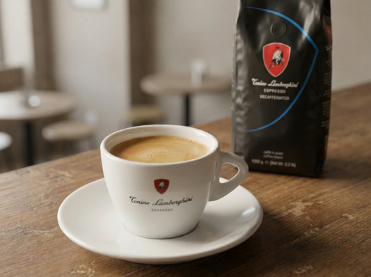 decaf espresso beans sits beside of the luxury italian espresso cup, they are branded with Tonino Lamborghini and made 100% in Italy