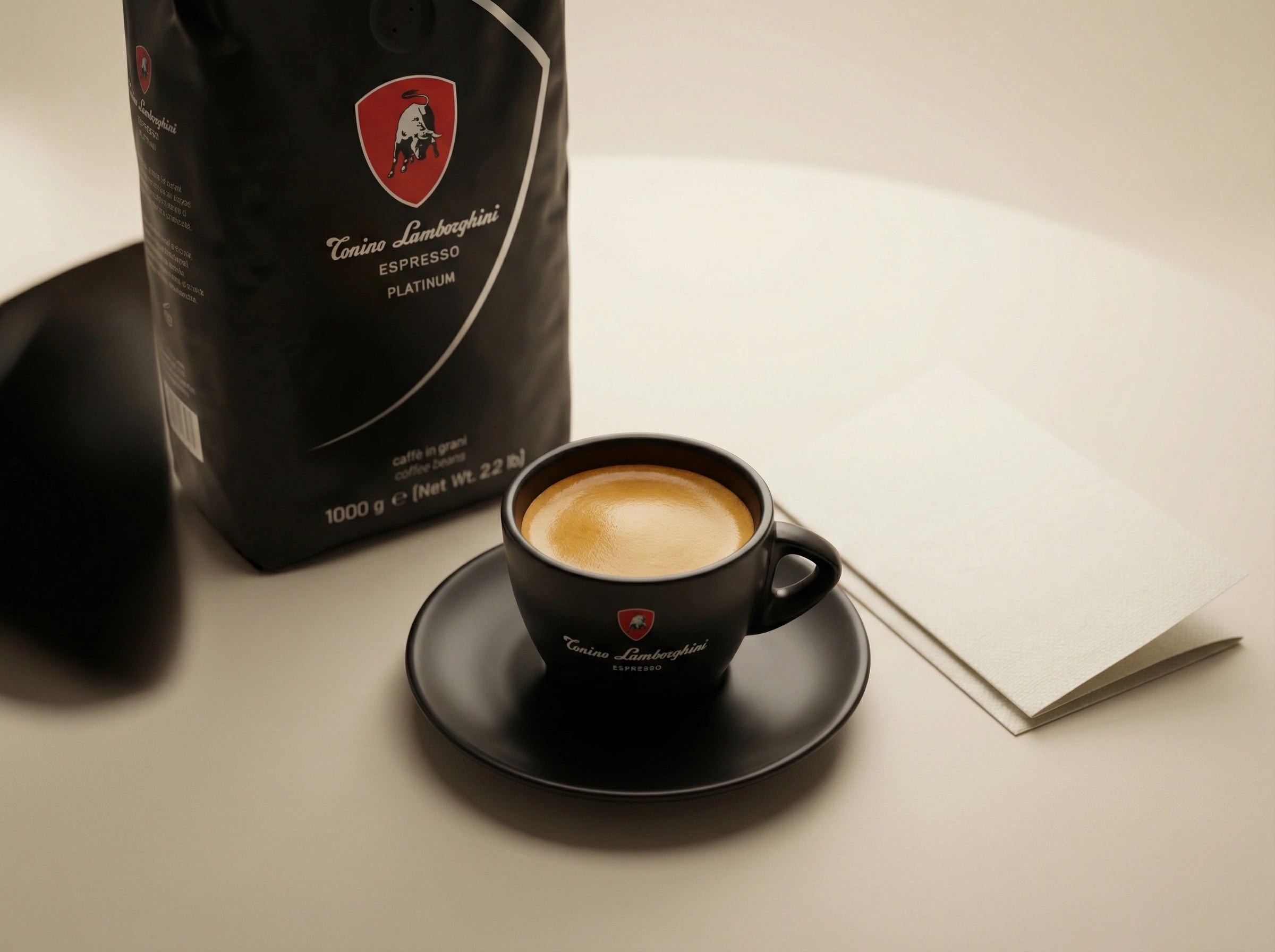Tonino Lamborghini coffee with rich crema, presented for an elegant unboxing.